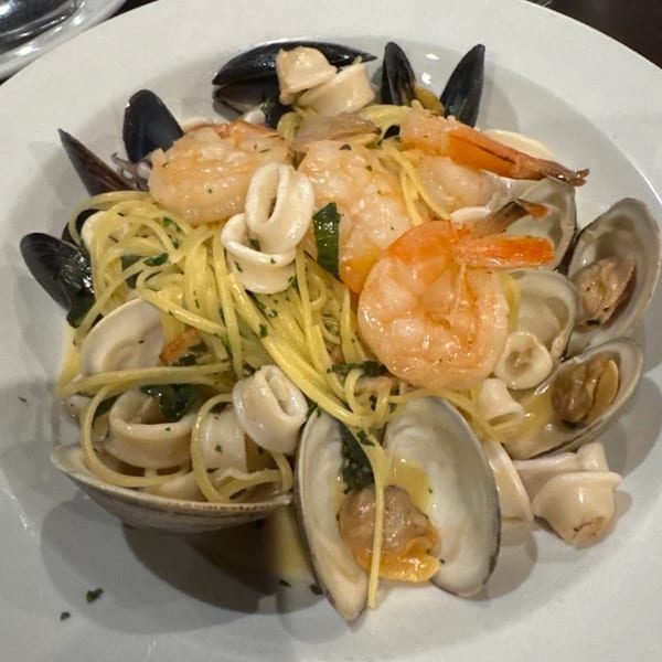 Linguine pasta with shrimp, mussels, clams, and calamari in a white wine sauce.